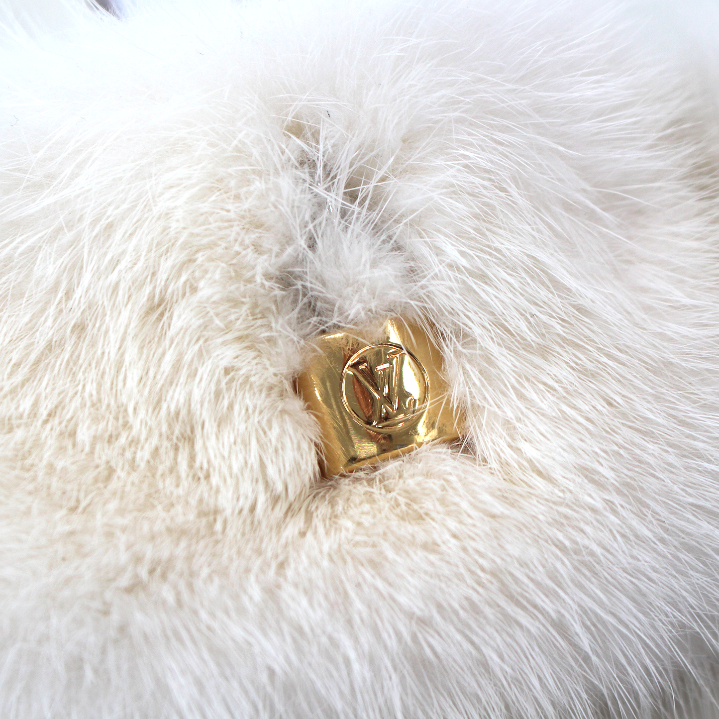 Louis Vuitton Mink Lock It Flats