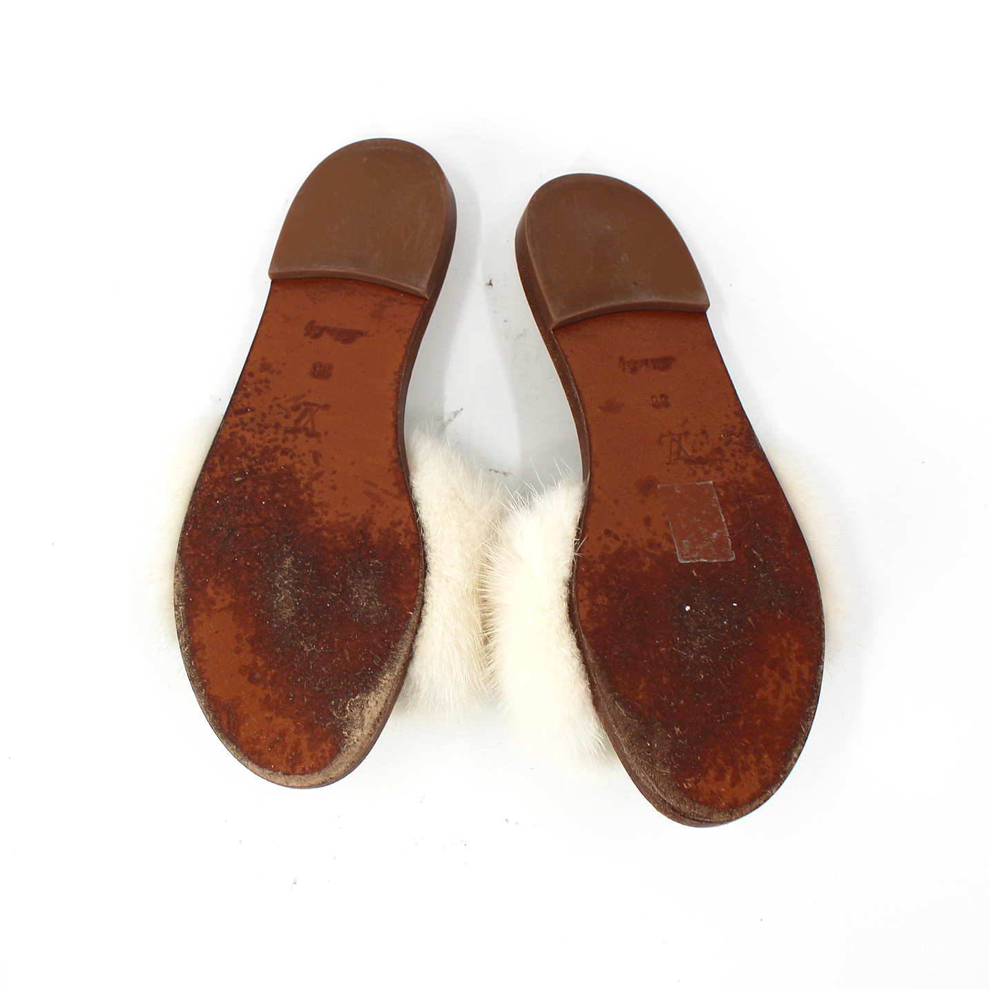 Louis Vuitton Mink Lock It Flats