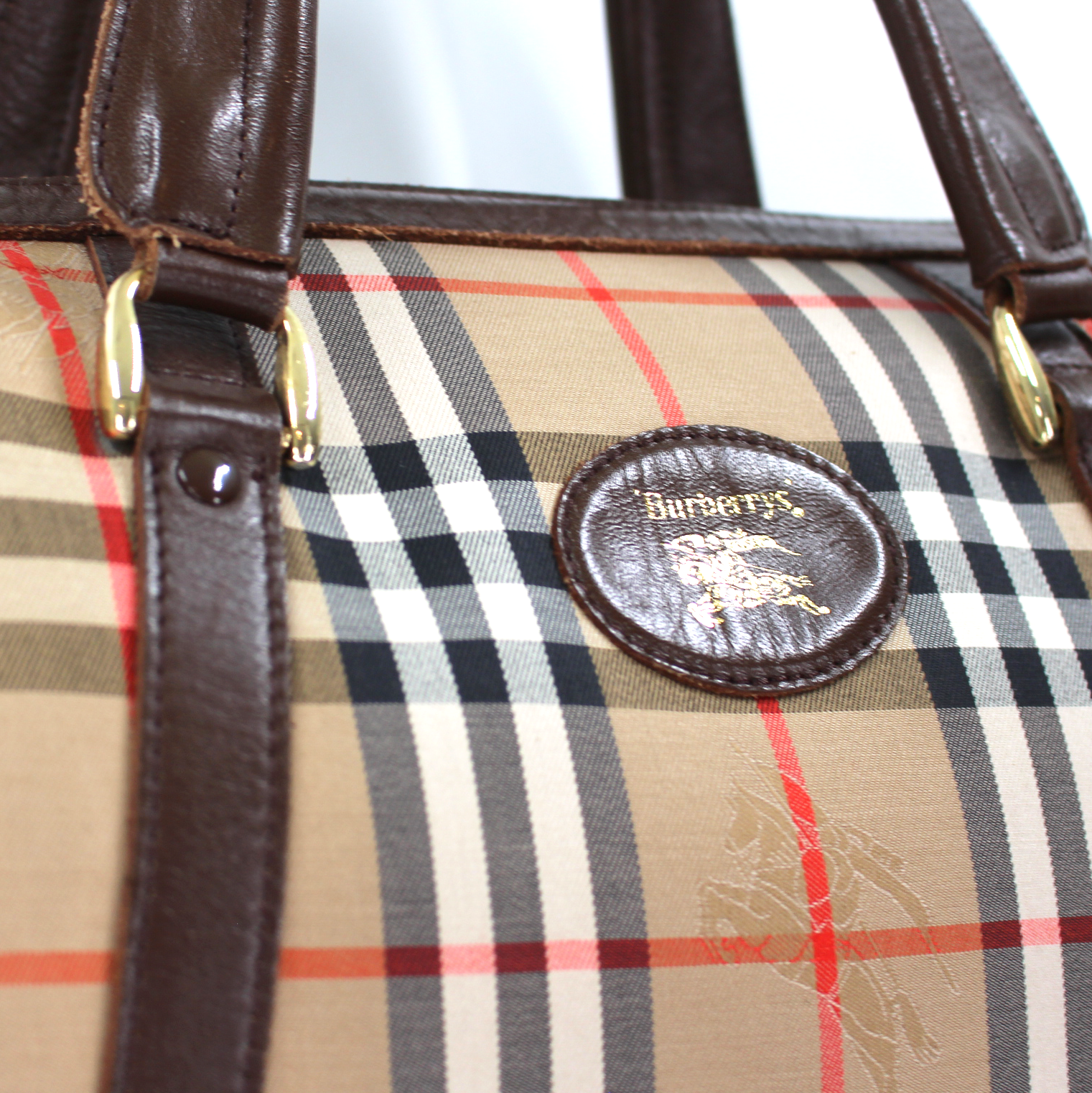 Burberry Haymarket Boston Brown Leather Nova Check Duffle Bag – The Closet  New York